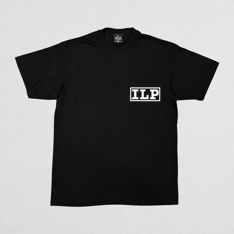 A black short-sleeve crewneck t-shirt with a white rectangular box logo containing the letters 'ILP' on the left chest, displayed flat against a light gray background.
