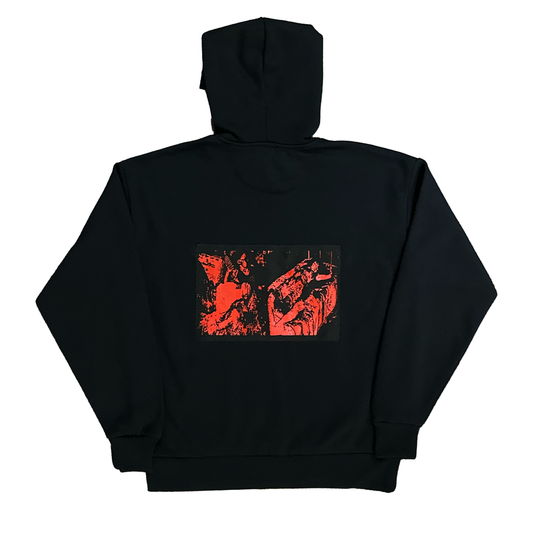 Black hoodie with red graphic on the back against a white background