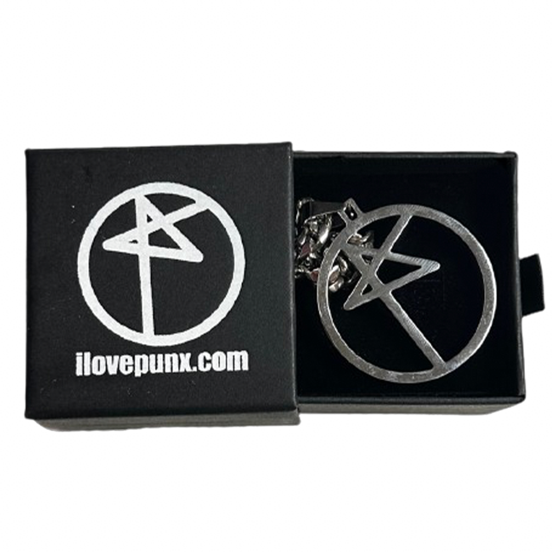 A stainless steel custom punx logo pendant on a black chain, presented in a black jewelry box with a white logo on the lid.